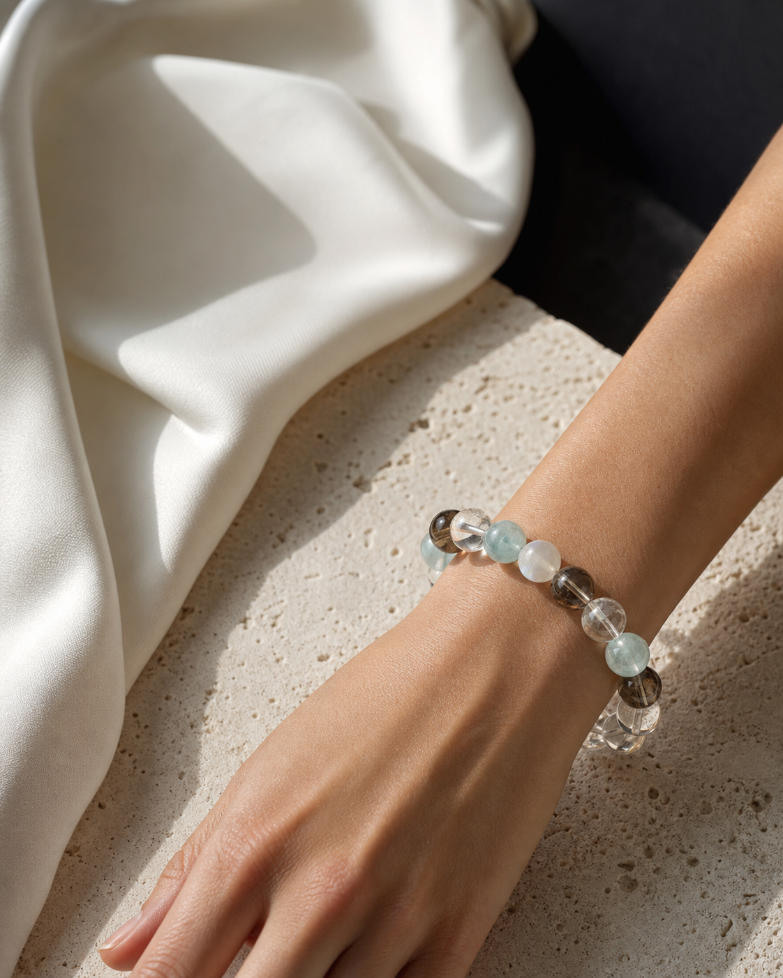 Aucelia natural crystal bracelet worn on a wrist