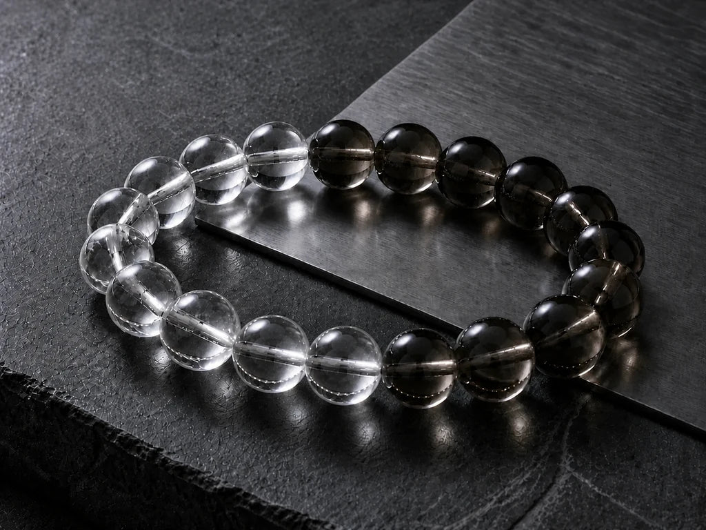 A finished bracelet of full-size clear and smoky quartz beads