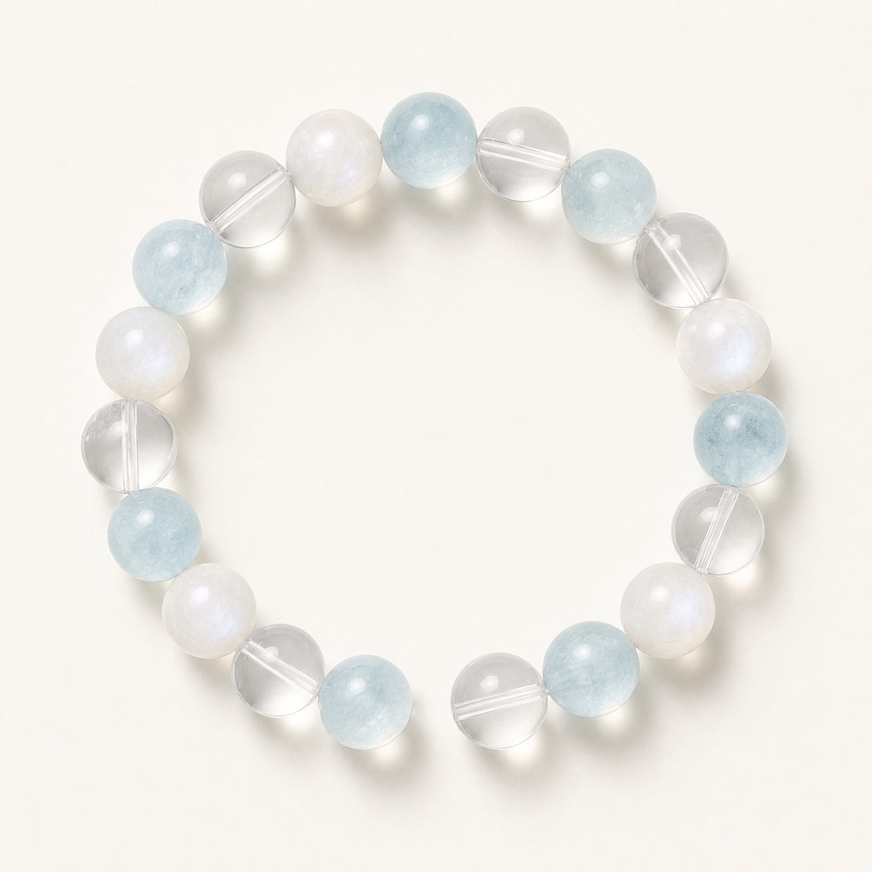 Pale blue, clear and milky natural crystal bracelet composition