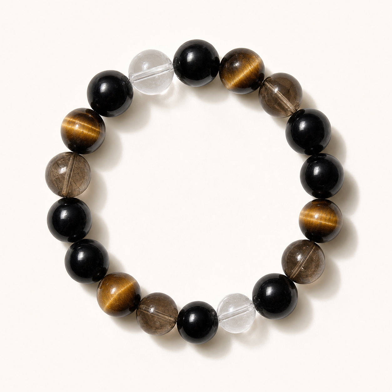 Black, smoke and golden brown natural bead bracelet composition